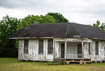 An old condo building, illustrating age of building as a premium factor.